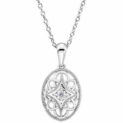 Our Granulated Filigree Sterling Silver Diamond Accented Necklace is a stunning addition to any ladies' jewellery collection. Crafted from high-quality rhodium-plated sterling silver, this necklace features intricate filigree detailing that is sure to catch the eye. A 0.03ct natural diamond accent adds just the right amount of sparkle to the pendant's heart.