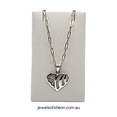 Modern Design Heart with Swirls Pendant crafted from 925 Sterling Silver and sits on a 1.95mm Elongated 45cm (18in) Cable Chain, that has featured in Elle and Harper's Bazaar Magazine. All crafted from 925 Sterling Silver and from Jewels of St Leon, Australia's Best Jewellery Store.