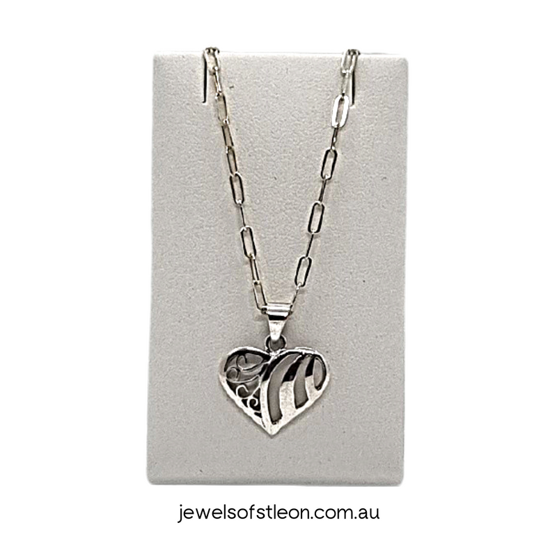 Modern Design Heart with Swirls Pendant crafted from 925 Sterling Silver and sits on a 1.95mm Elongated 45cm (18in) Cable Chain, that has featured in Elle and Harper&