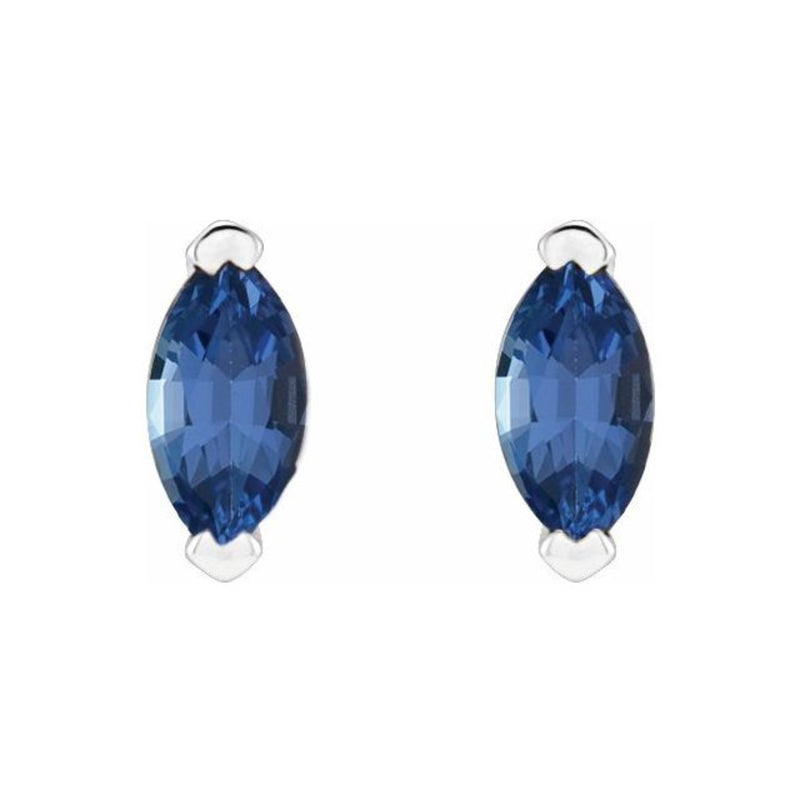 A pair of natural marquise-shaped Tanzanite stud earrings in blue color, set in platinum.