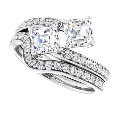 Accented Two Stone Engagement Ring known as Toi et Moi (French for You and Me), set with two (2) 0.50ct natural diamond and eighteen accent diamonds in 14K white gold engagement ring with contoured diamond accented wedding band. Available from Jewels of St Leon Engagement Rings Australia.