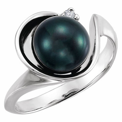 Top view of our Black Akoya Cultured Pearl and Diamond Dress Ring crafted in 14kt White Gold. A beautiful free flowing design, this ring would suit everyday wear or special occasions only.