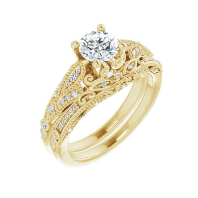 Vintage inspired Diamond Engagement ring with diamond accents and matching diamond accented matching wedding band. Available from Jewels of St Leon Australian Bridal Jewellery Specialists.