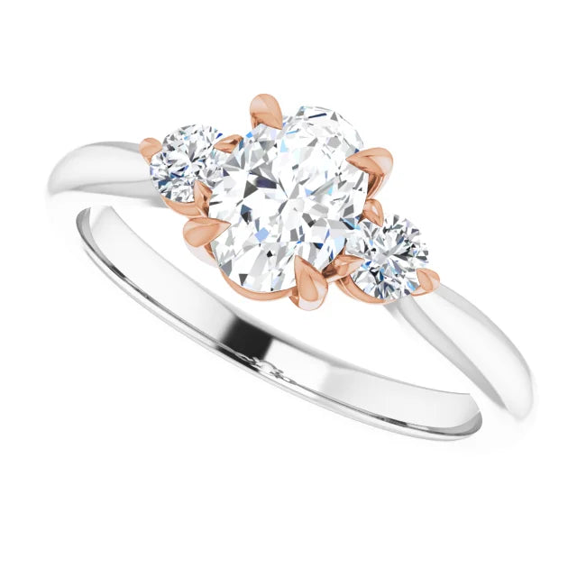 14K White Gold Band with a 14K Rose Gold setting, with three natural diamonds in a classic style. Available from Jewels of St Leon Jewellery Australia