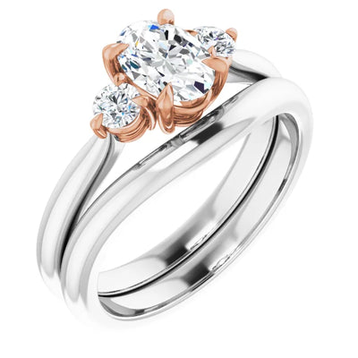 14K White Gold Band with a 14K Rose Gold setting, with three natural diamonds in a classic style and matching wedding band. Available from Jewels of St Leon Jewellery Australia