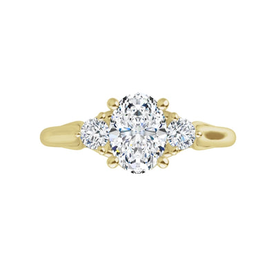 Three Stone Vintage Inspired Diamond Engagement Ring. Oval-cut diamond centre with two side stone, set in 14K yellow gold, also available in Rose and White gold. Available from Online Jewellery Jewels of St Leon Australia